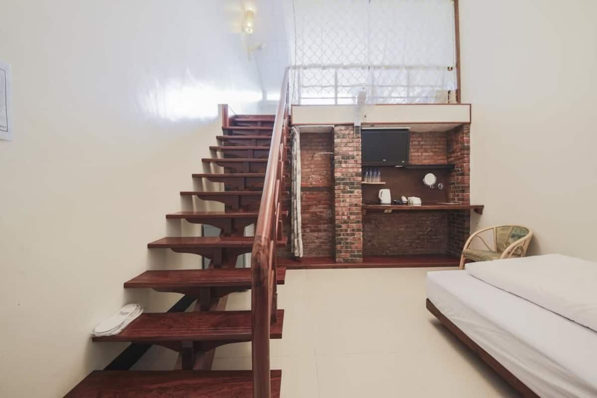 Habitación cuádruple Deluxe | Escritorio, cortinas blackout, insonorización y wifi gratis