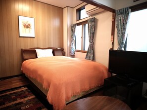 Western Style Room 201 | Down comforters, free WiFi