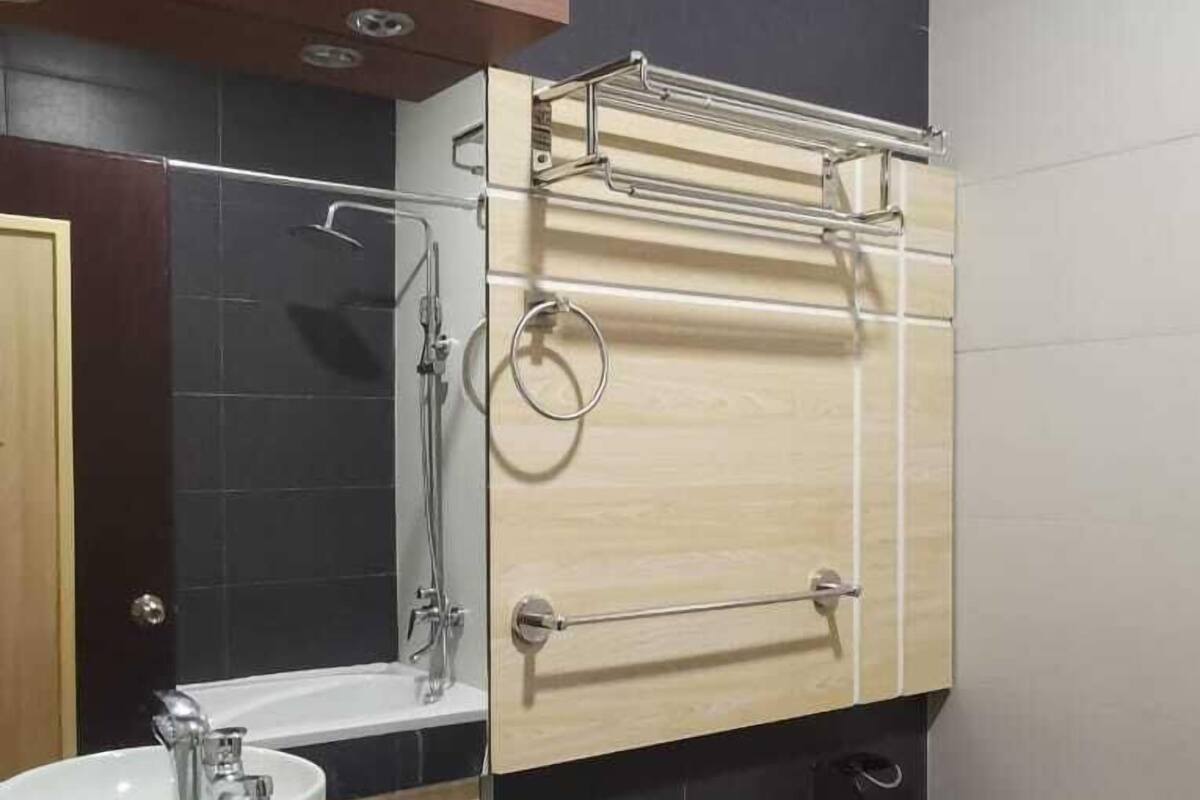 rajaudang room | bathroom | combined shower/bathtub, rainfall showerhead, slippers, bidet