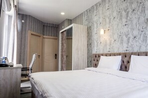 Blackout curtains, soundproofing, free WiFi, bed sheets