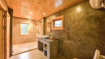 Shower, free toiletries, slippers