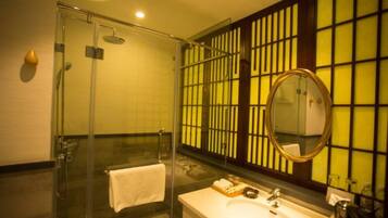Shower, free toiletries, slippers