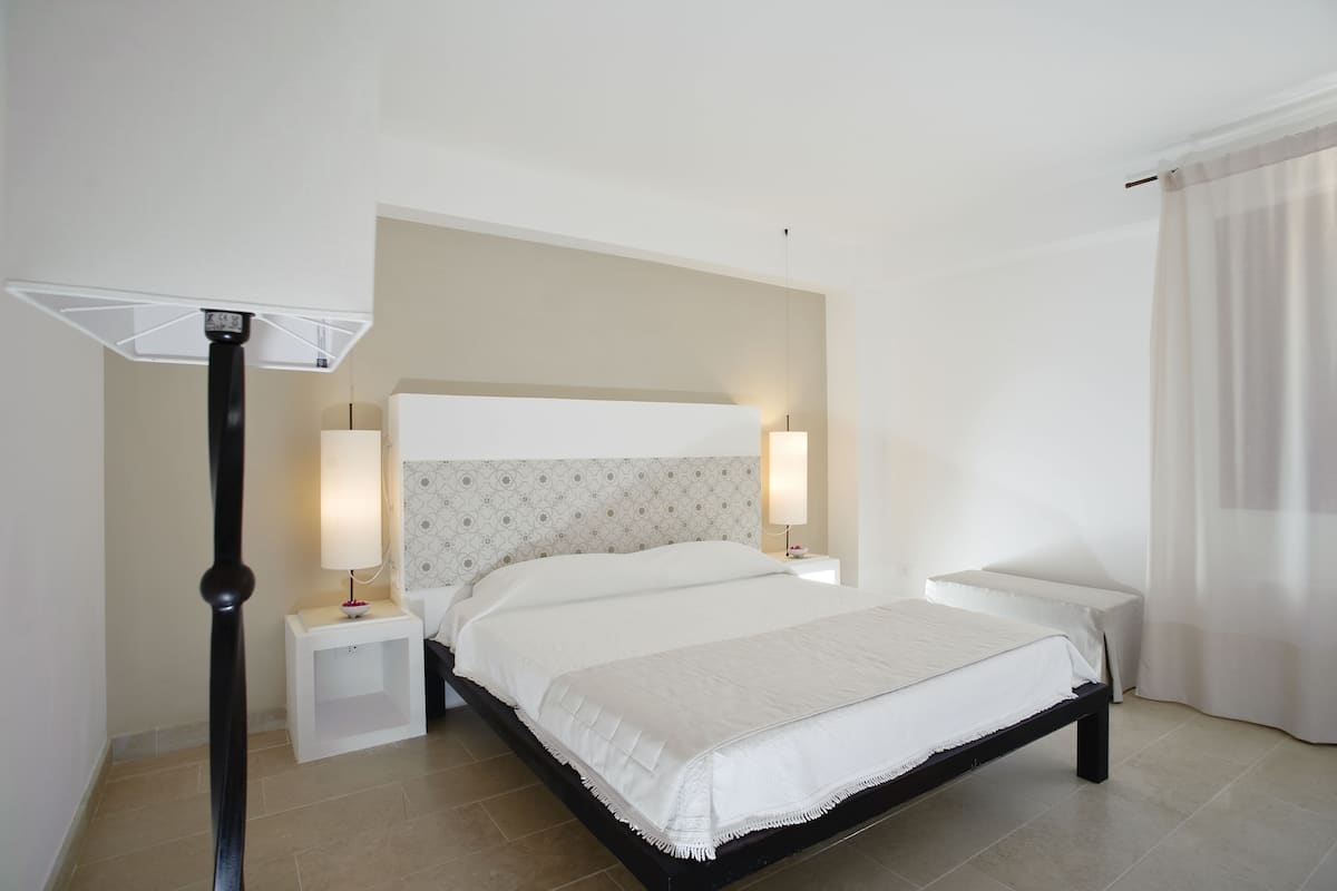 Superior Double Room, Patio | In-room safe, individually furnished, desk, laptop workspace