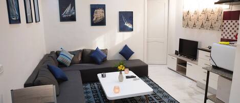 City Apartment, Smoking | Living area | 32-inch flat-screen TV with satellite channels, TV