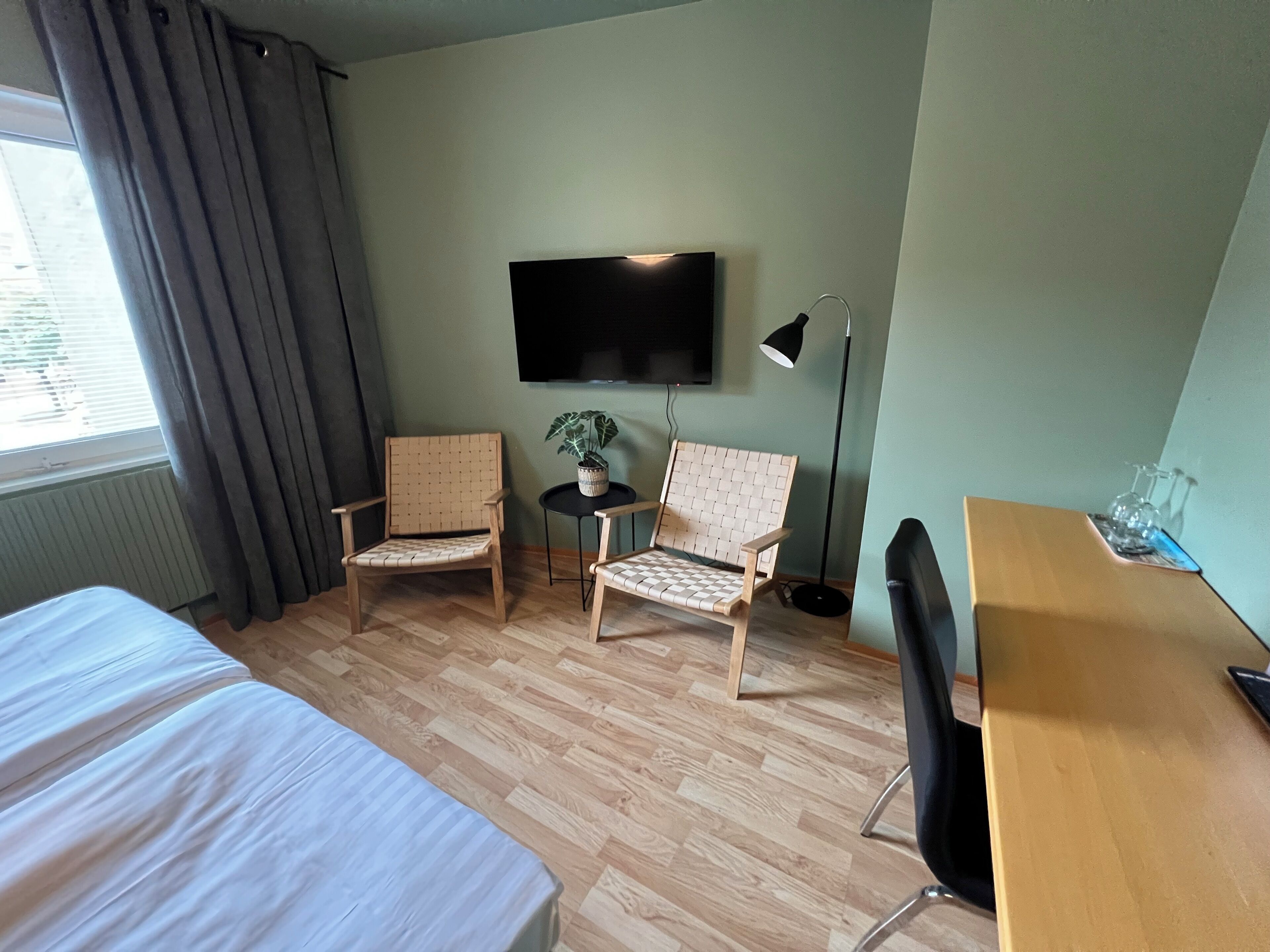 double or twin room (private bathroom) | desk, laptop workspace, blackout curtains, iron/ironing board