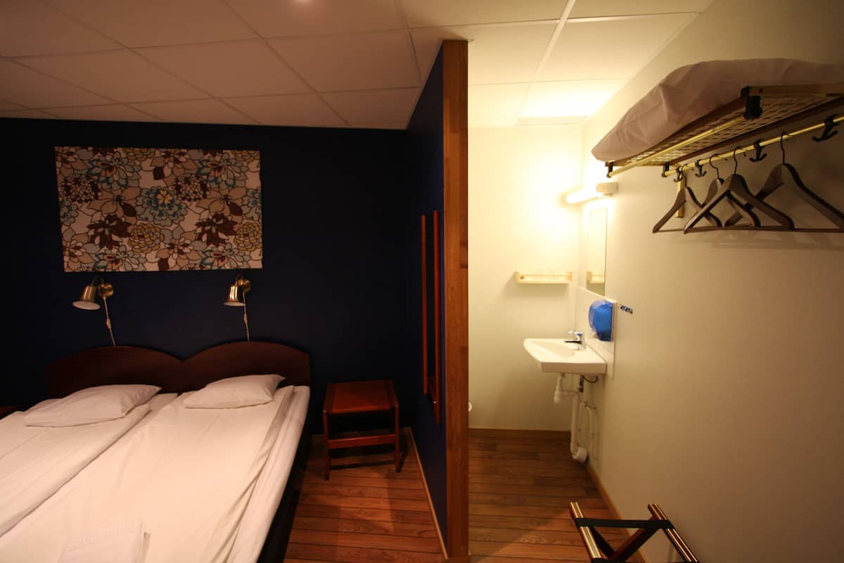 Double or Twin Room (Shared Bathroom) | Desk, laptop workspace, blackout drapes, iron/ironing board