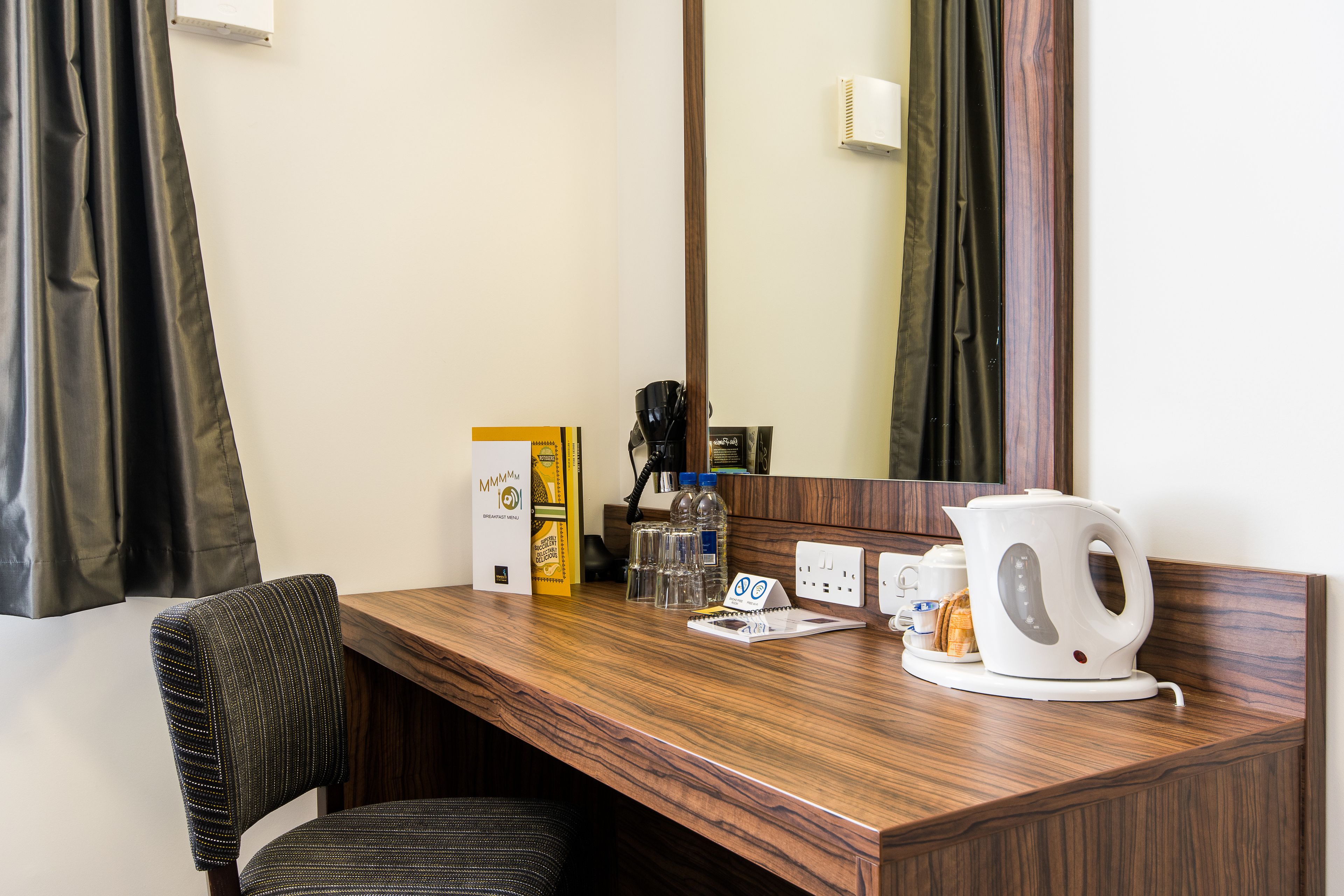 desk, blackout curtains, soundproofing, iron/ironing board