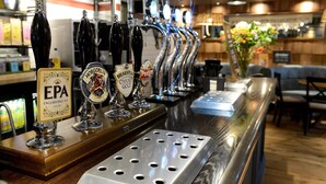 A bar area with multiple beer taps, including brands like Brakspear and Oxford Gold, and a sign for English Pale Ale. - Fallow Field, Telford by Marston's Inns (Telford)