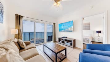 Comfort Condo, 2 Bedrooms, Balcony, Partial Ocean View | Living room | 50-inch Smart TV with cable channels