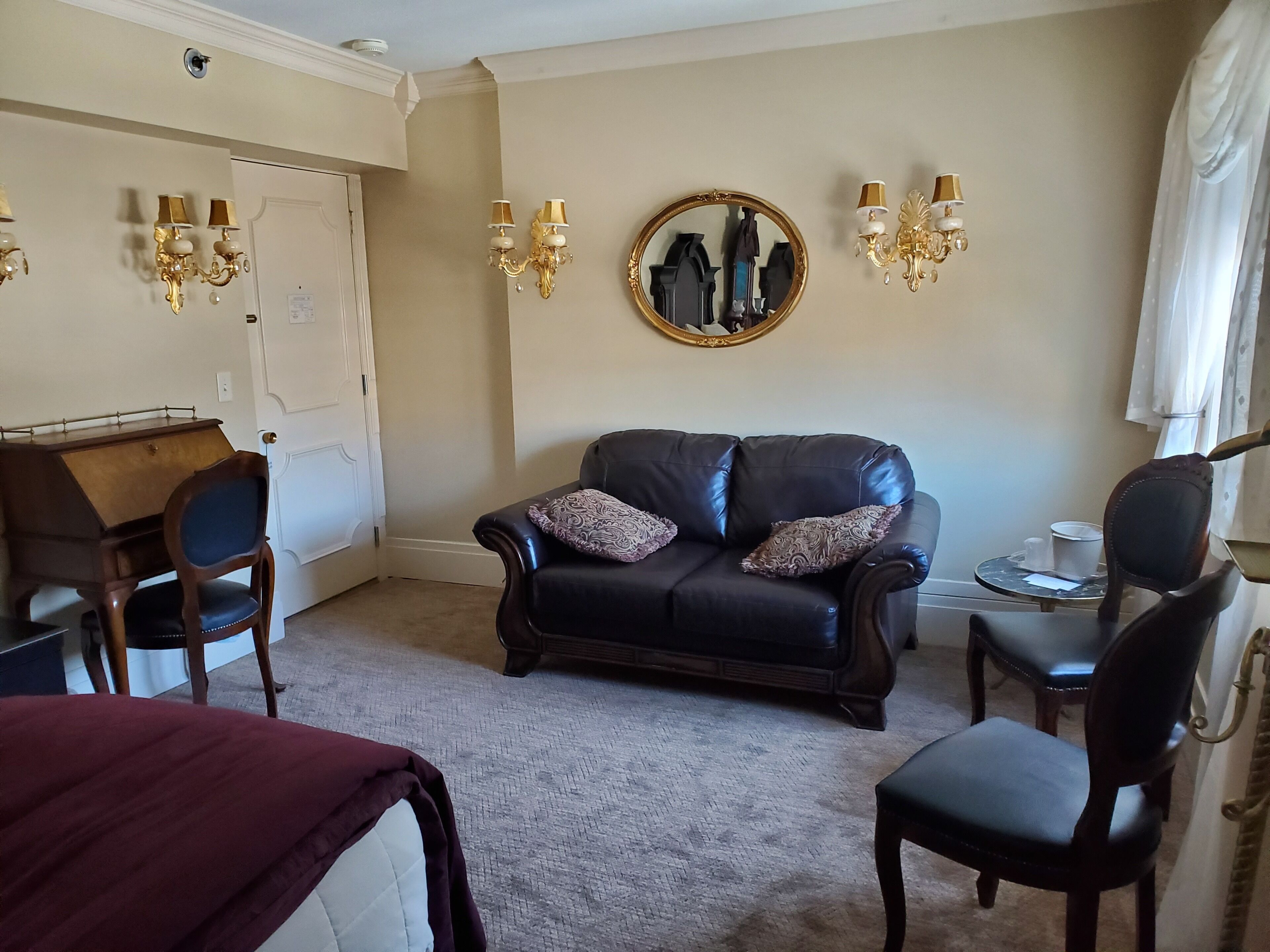 deluxe quadruple room 334 | living area | 32-inch flat-screen tv with cable channels, tv