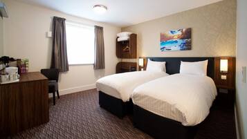 Desk, laptop workspace, blackout drapes, iron/ironing board