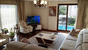 Apartment, Garden View | Living room | LCD TV