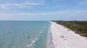 On the beach, sun-loungers, beach towels