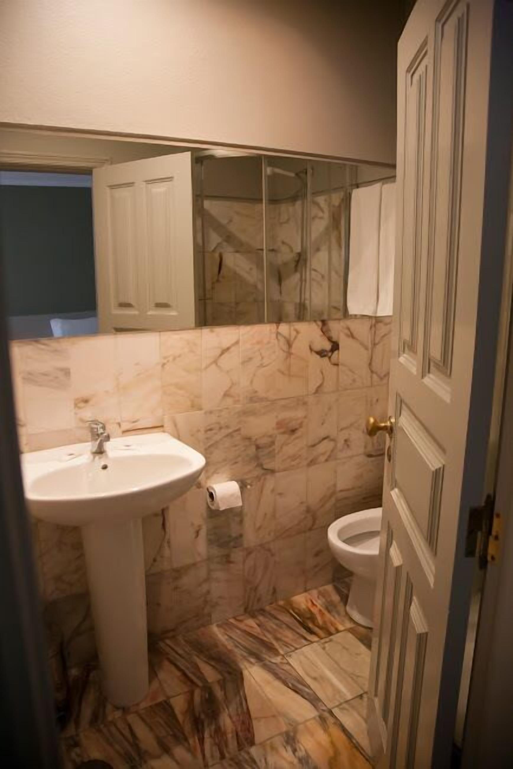 deep-soaking bathtub, free toiletries, hair dryer, towels