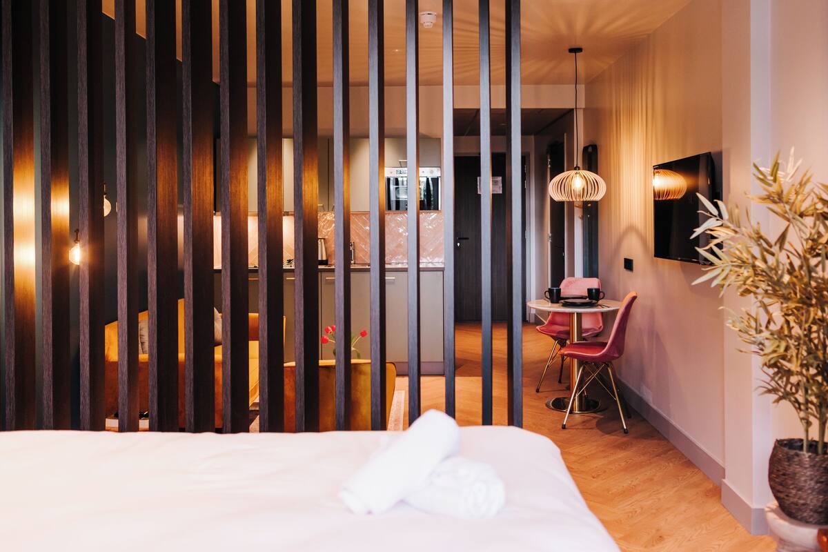 comfort apartment | living area | flat-screen tv