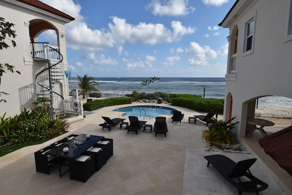 The Courtyard - Sand and Sky on left and Crescent Beach House on right