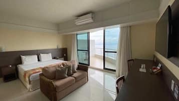 Luxury Room | Living area | 49-inch LCD TV with cable channels, TV