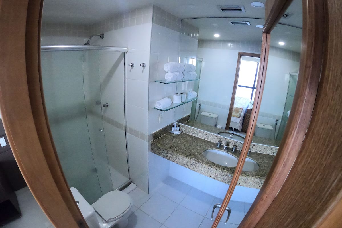 premium double room | bathroom | shower, free toiletries, towels