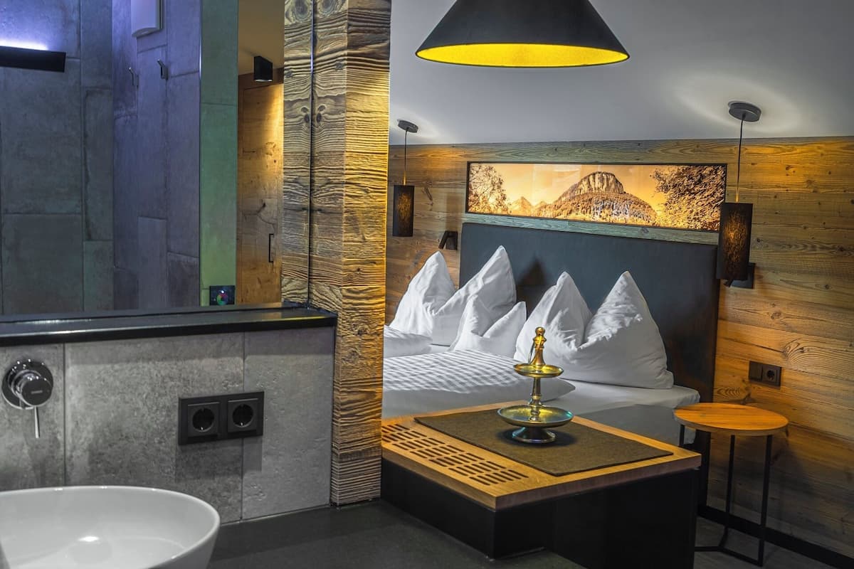 Deluxe Double Room, Balcony, Mountain View | In-room safe, blackout drapes, WiFi (free), bed sheets