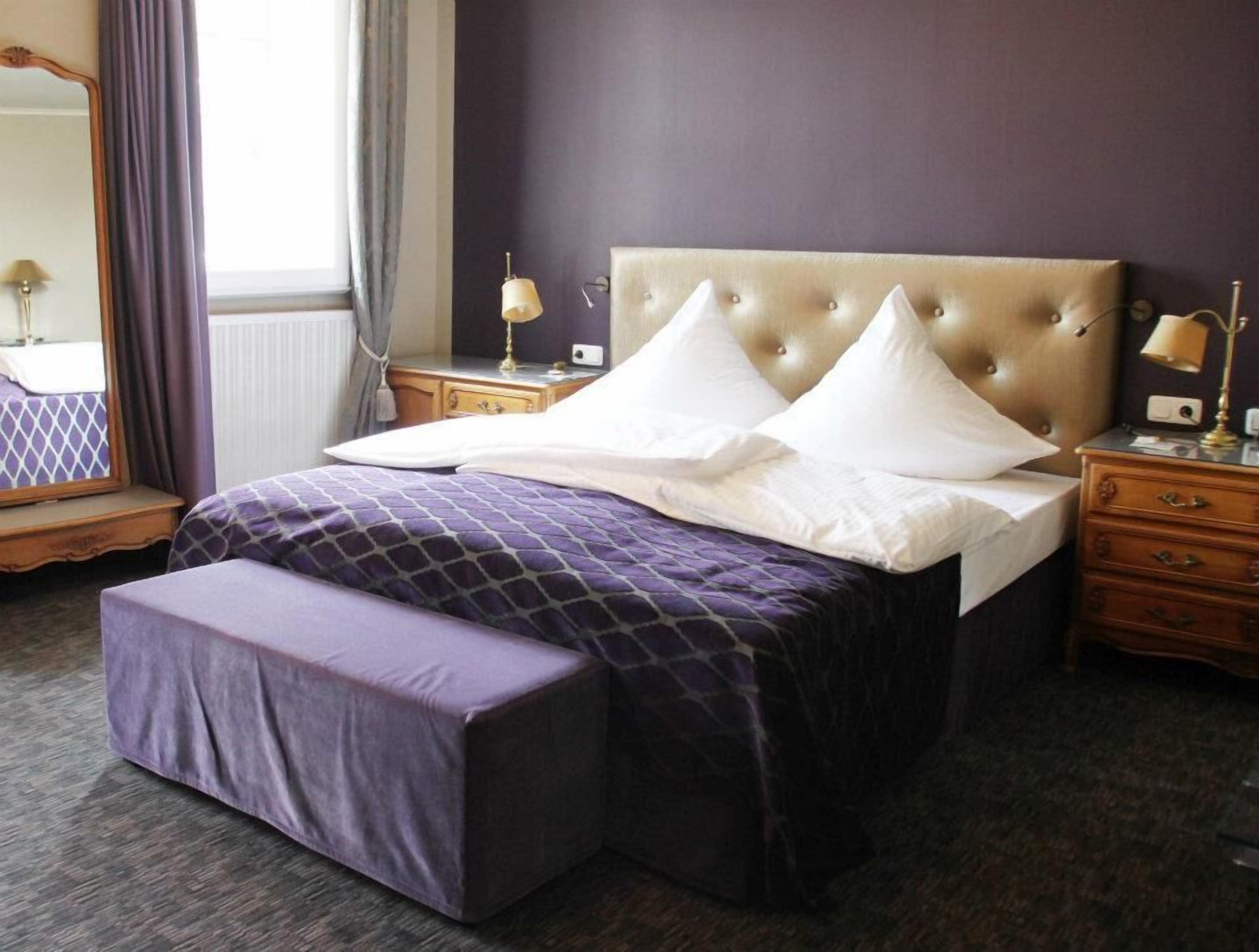 Deluxe-Suite | Minibar, Zimmersafe, individuell dekoriert, individuell eingerichtet