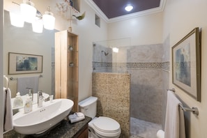 Combined shower/bathtub, hair dryer, towels, soap