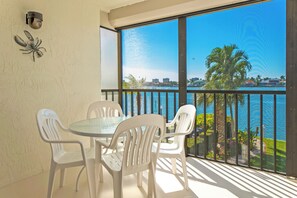 Outdoor dining - Bayside Club Unit 207 - What a view!  Owner requires reservation for 3 months, Jan- March. (Marco Island)