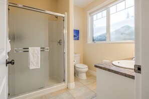 Bathtub, hair dryer, towels, soap