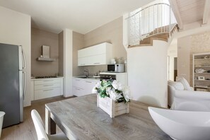 Fridge, stovetop, cookware/dishes/utensils