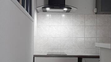 Fridge, microwave, stovetop, coffee/tea maker