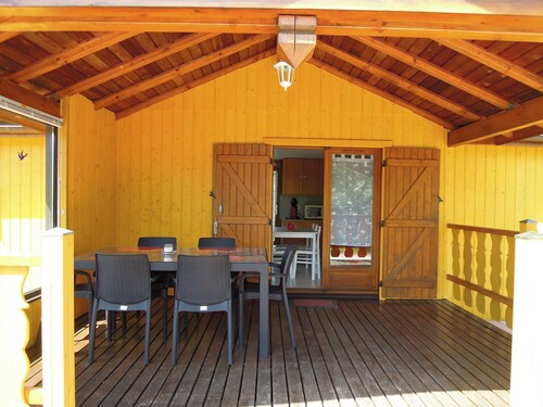 Fenced cottage rental with barbecue and children's play area