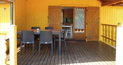 Fenced cottage rental with barbecue and children's play area