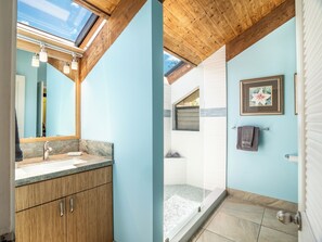 Combined shower/tub, hair dryer, towels, soap