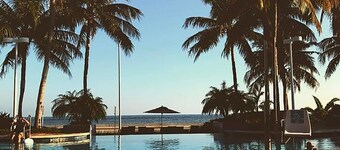 Luxurious top floor, end unit, within premier resort on the Atlantic Ocean.