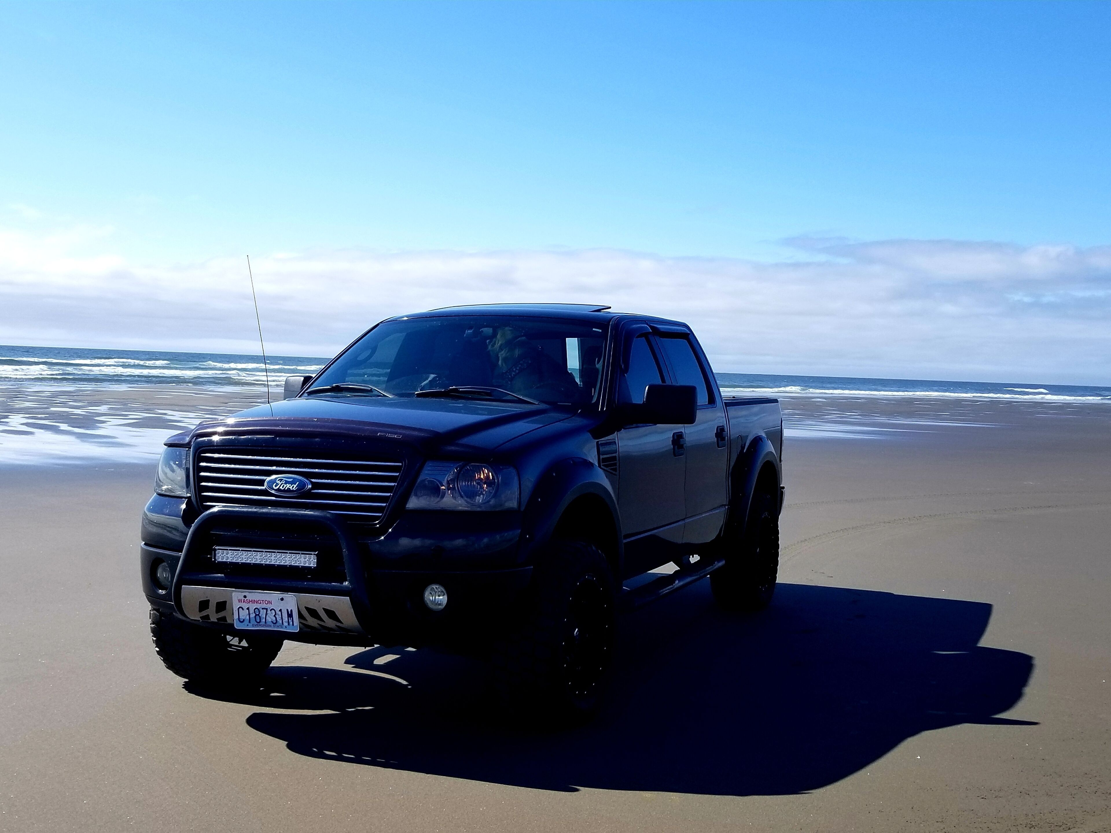 On the beach, sun loungers, beach towels