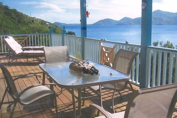 panoramic bay view covered deck patio with outside dining area
