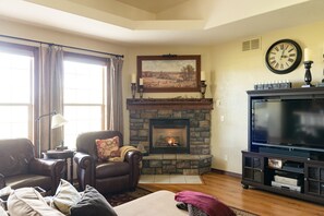 Smart TV, fireplace, DVD player, books