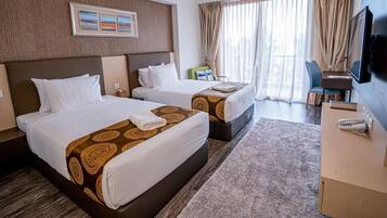 In-room safe, desk, laptop workspace, blackout curtains