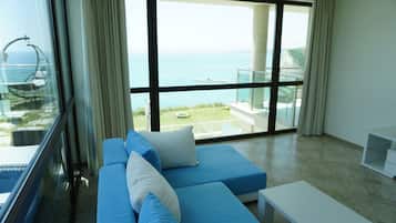 Comfort Apartment, 2 Bedrooms, Balcony, Sea View | Living area | Flat-screen TV