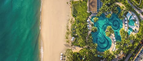 On the beach, beach towels, beach volleyball, beach bar