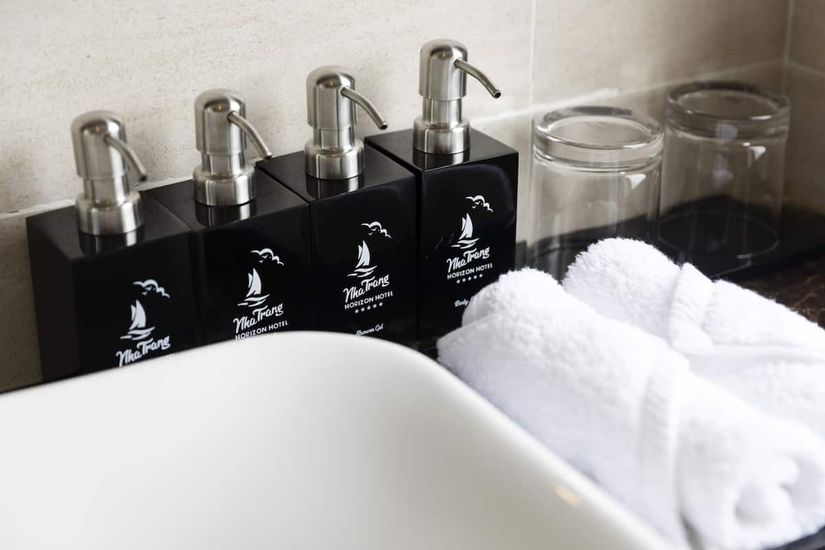 hair dryer, slippers, soap, shampoo