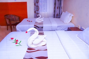 Premium bedding, down duvets, desk, blackout curtains