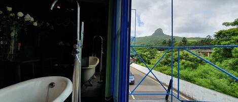 Economy Double Room | Bathroom | Rainfall showerhead, free toiletries, hair dryer, slippers