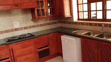 Apartment | Private kitchen | Fridge, microwave, oven, stovetop