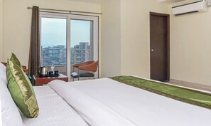 Standard Room, City View | Iron/ironing board, rollaway beds, free WiFi, bed sheets - Treebo Trip Vikrant's Residency (Gurugram)