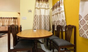 Enjoy meals in this cozy dining area with a round table and six comfortable chairs.