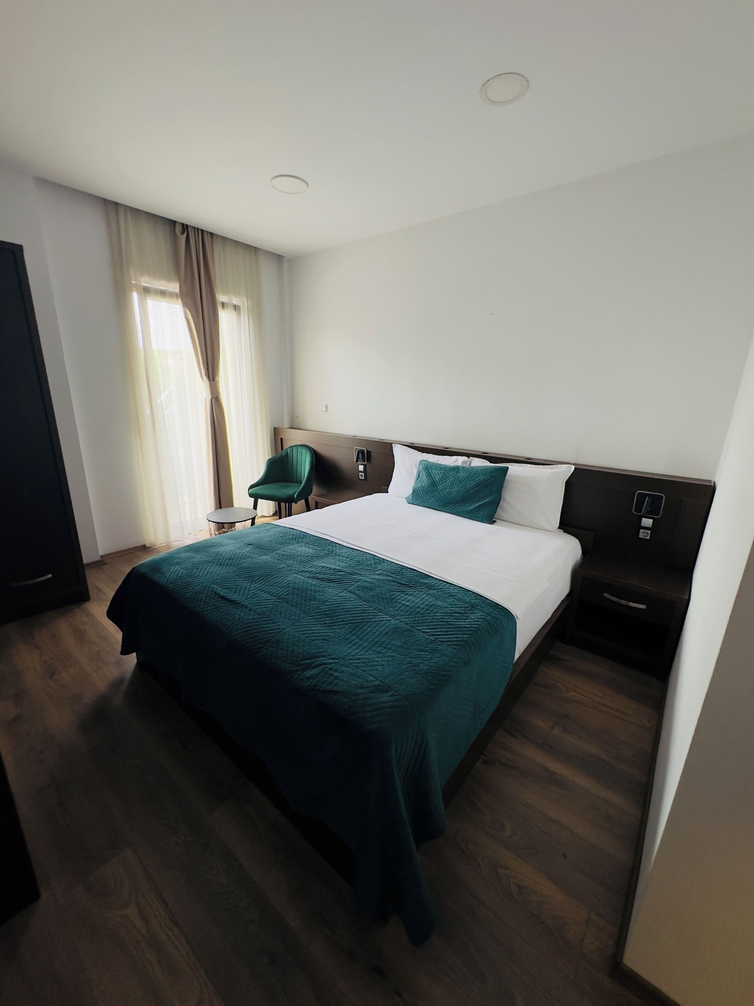 double room, private bathroom, city view | minibar, desk, laptop workspace, soundproofing