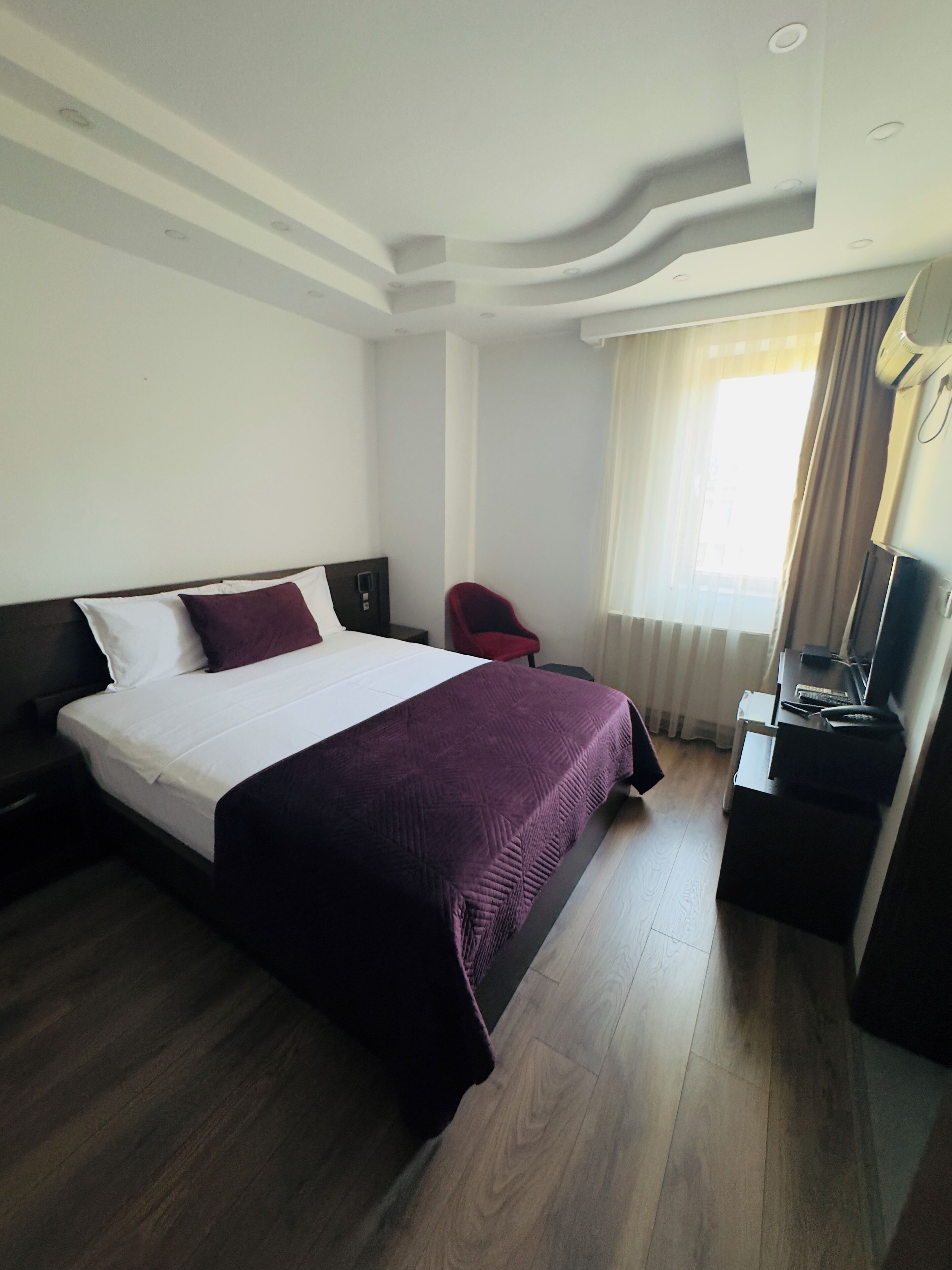 double room, private bathroom, city view | minibar, desk, laptop workspace, soundproofing