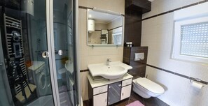 Departamento Deluxe | Baño | Regadera, amenidades de baño gratuitas, secadora de cabello, toallas 