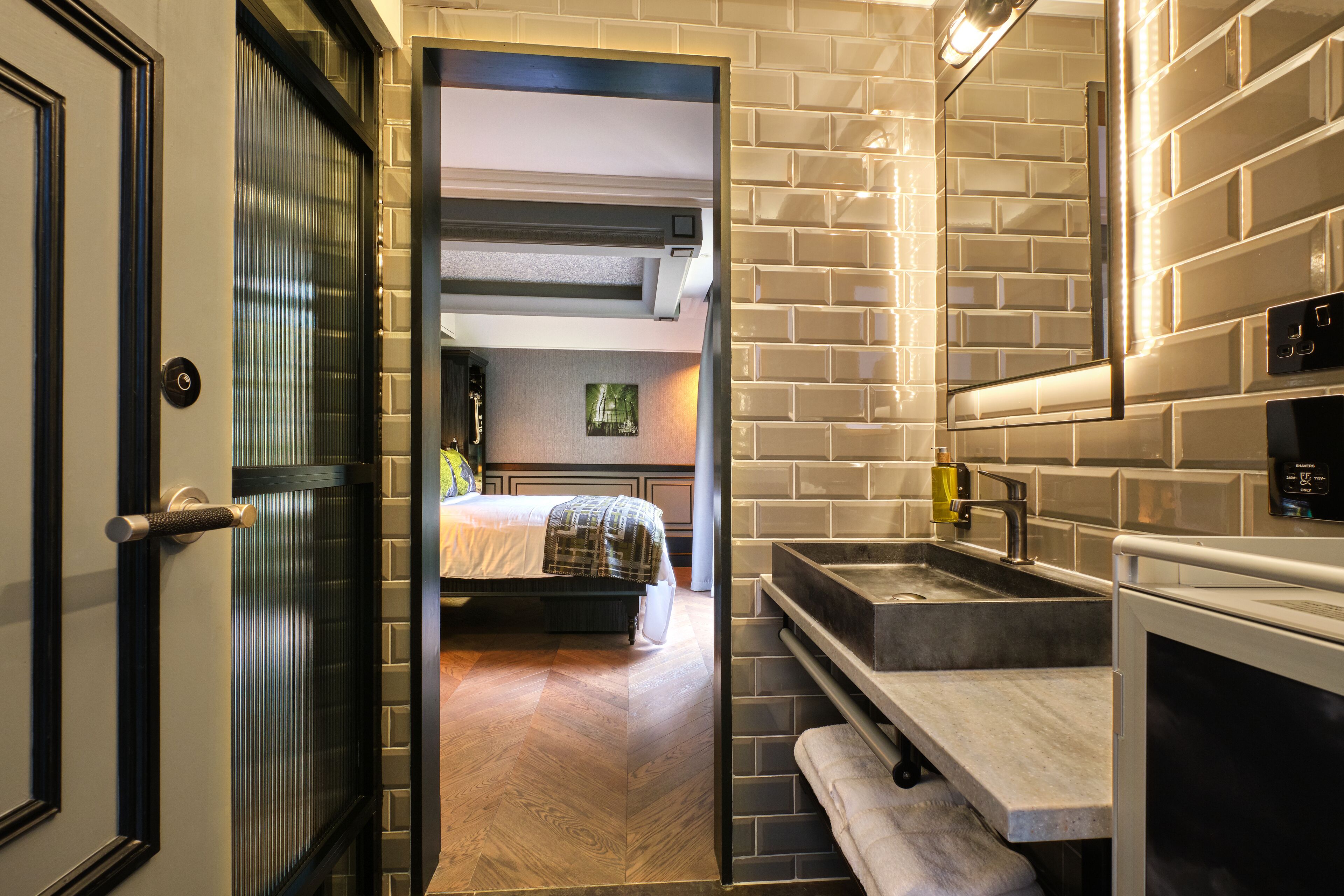 designer toiletries, hair dryer, bathrobes, towels