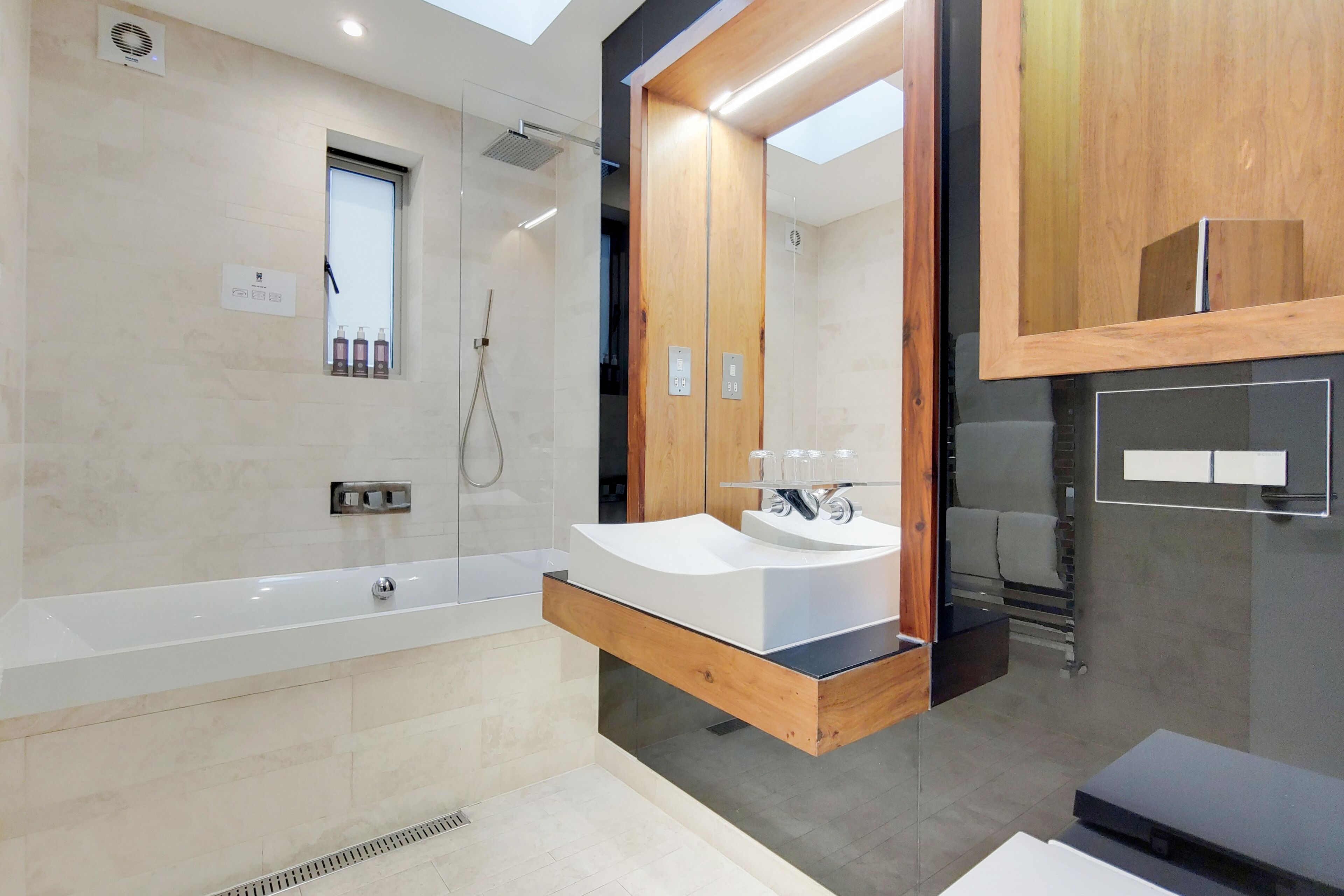 studio residence at the gyle | bathroom | designer toiletries, hair dryer, bathrobes, towels